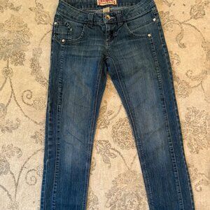 Peace love low rise skinny jeans